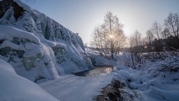 Beautiful Winter Landscape the Movement of the Sun Through a Tree in Winter a Frozen Waterfall Time alt