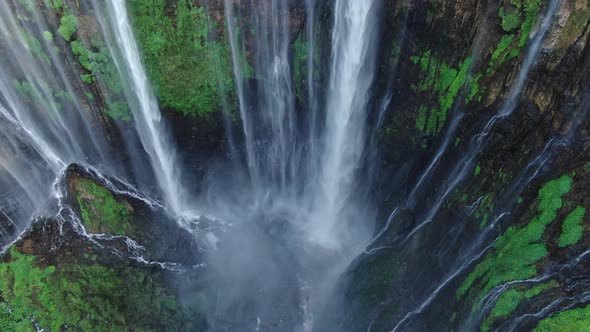 Aerial view of epic powerful waterfall alt