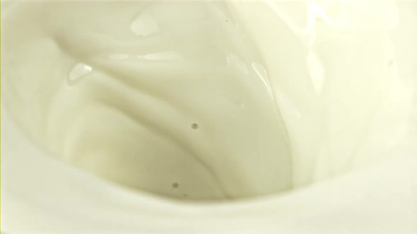 A Whirlpool of Fresh Milk with Air Bubbles alt