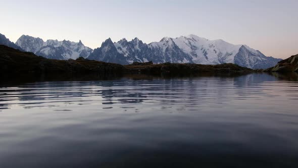 Colourful Sunrise on Chesery Lake in France Alps