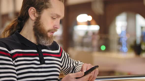 Side View Caucasian Man Adult Business Person Freelancer Guy with Beard and Long Hair Runs His alt