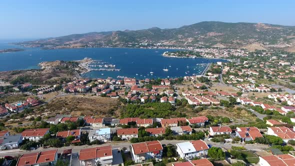Small City Houses, Beautiful Marina and Touristic Boats in a Bay by Sea alt