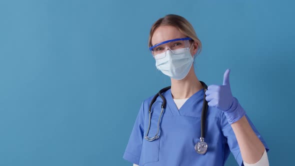 Nurse giving you the thumbs up while working. Concept of safety life