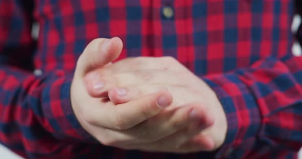 Hands of an anxious man alt