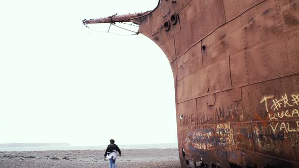 Rusted Shipwreck on the Beach in Patagonia, Argentina. alt