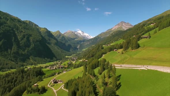 Green village of Heiligenblut in the Alps, aerial footage alt