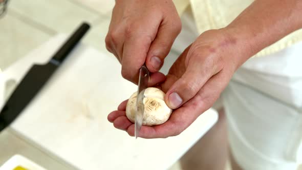 Chef Carves Pattern on Champignons Before Frying for Beautiful Decoration