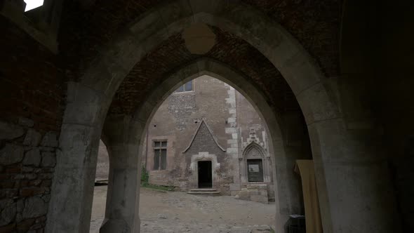 Brick gate entrance to Corvin Castle alt