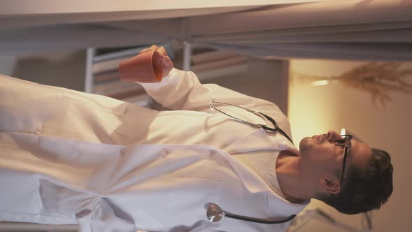 Take Pause Relaxed Male Doctor Enjoying Silence alt