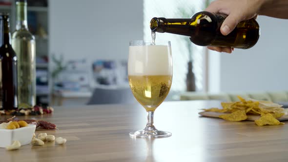 Pouring Beer In To Glass