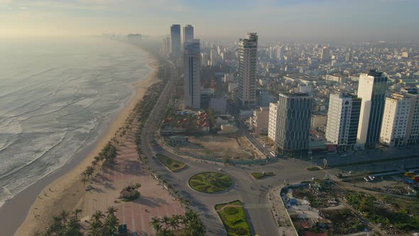 Aerial Slowmotion Shot of the Coastal Part of the City of Danang in Central Vietnam alt