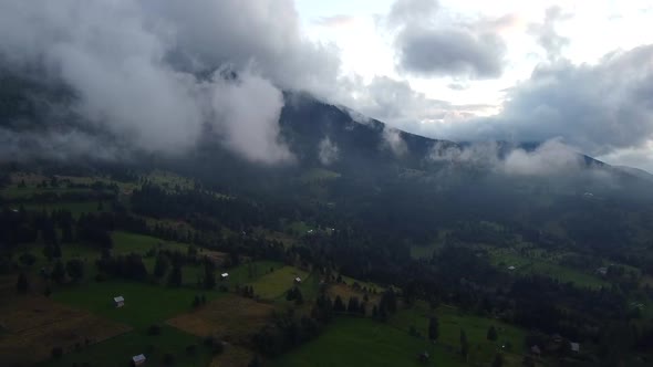 Dramatic Clouds In Mountains Aerial View, Maramures, Romania alt