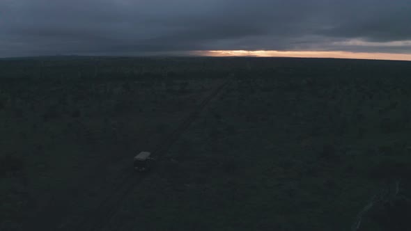 Aerial drone view of wildlife safari adventure holiday at sunrise in Laikipia, Kenya, Africa alt