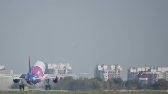 The Plane Takes Off From the Runway of the Airport alt