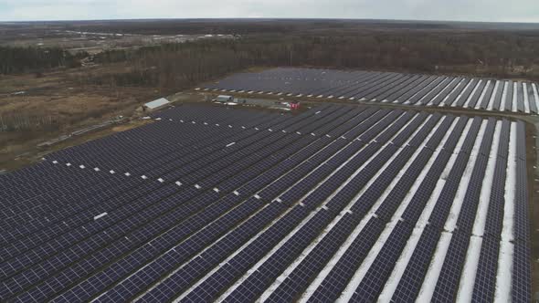 Solar Battery Field in Winter Aerial View alt