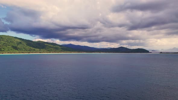 Drone Flight Over Blue Sea Towards Palawan Island alt