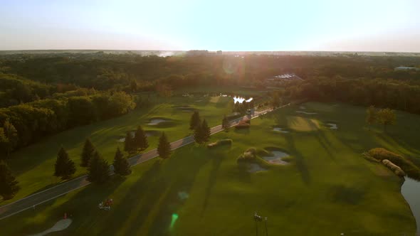 Aerial View of Green Field with Ponds alt