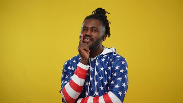 Medium Shot of Handsome African American Man Thinking Showing I Got an Idea Gesture but Shaking Head alt