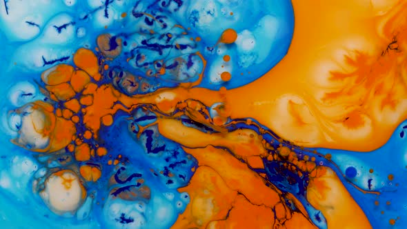 beautiful colored abstract background of moving and mixing liquid paints on water surfacered alt