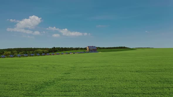 Solar farm on green field.  alt