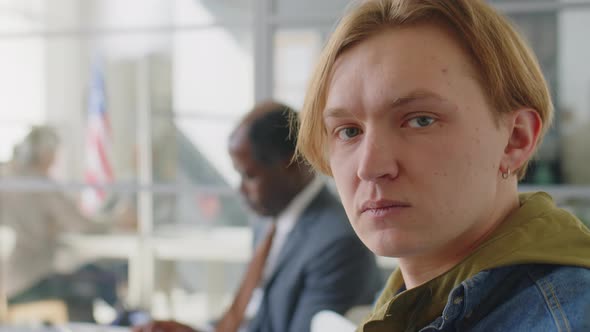 Portrait of Young Caucasian Man before Visa Interview alt