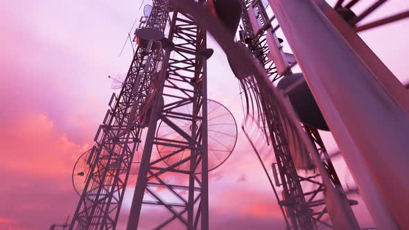 Antenna complex during sundown. Radio communication broadcasting transmitter. alt