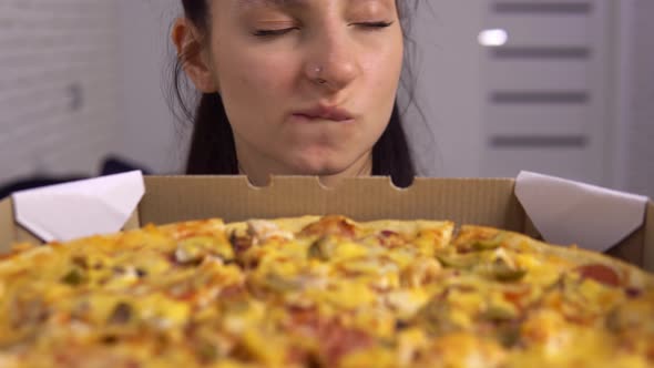 Hangry Dieting Woman Looking at Pizza