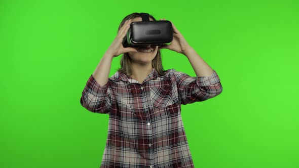 Woman Using VR Headset Helmet To Play Game, Dance. Watching Virtual Reality 3d Video. Chroma Key alt