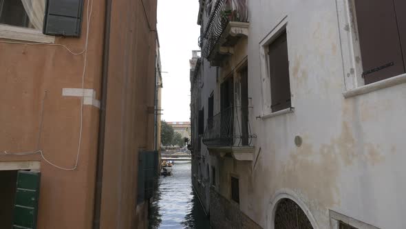 Narrow canal between old buildings
