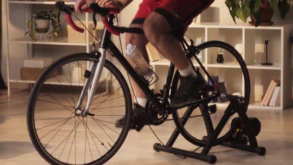 Sportsman Riding Bicycle Home Gym alt