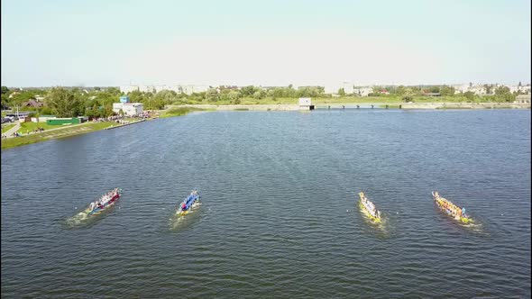Close Up of a Men's Rowing Team at the Beginning of Their Race alt