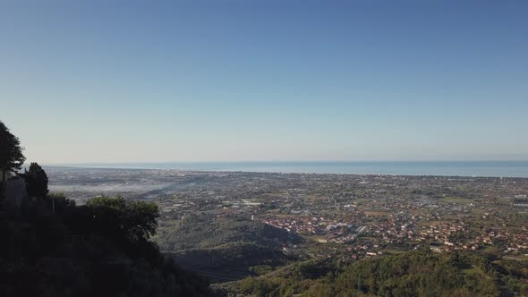 Drone Reveal Shot of Tuscan Coast and Lido di Camaiore in Italy alt