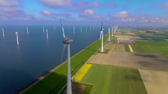 Wind Turbines in the Early Morning Wind Mill Park in the Netherlands alt