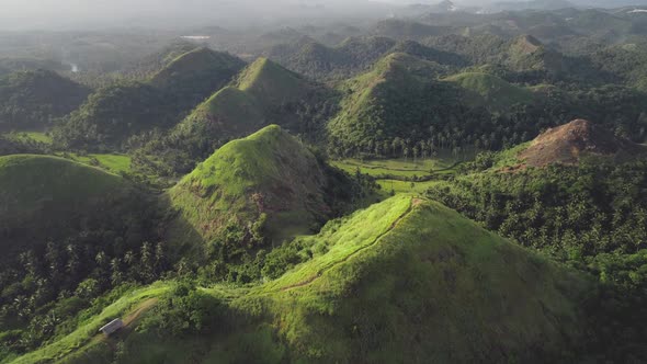 Mountains Landscape Aerial Building on Top of Mount with Hiking Path alt