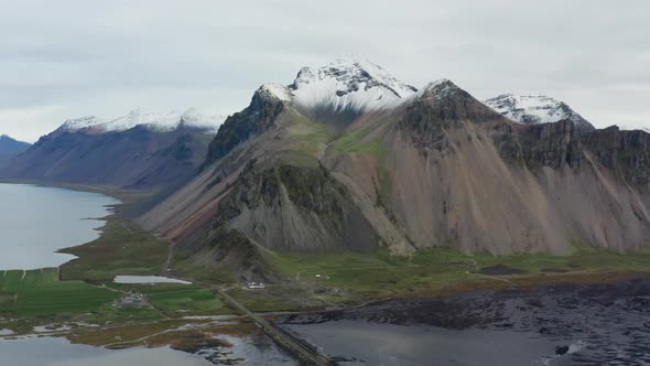 Drone Flight Of Vestrahorn Mountain With Snowy Peak alt