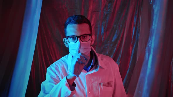 Medical or scientific secret. Doctor or scientist applying finger to lips urging to be silent alt