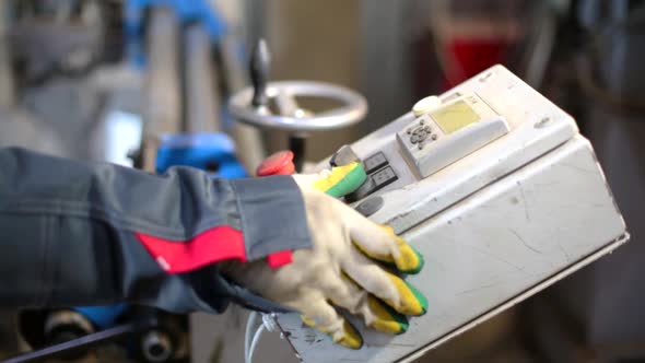 The Machine Bends a Sheet of Stainless Steel Into a Pipe