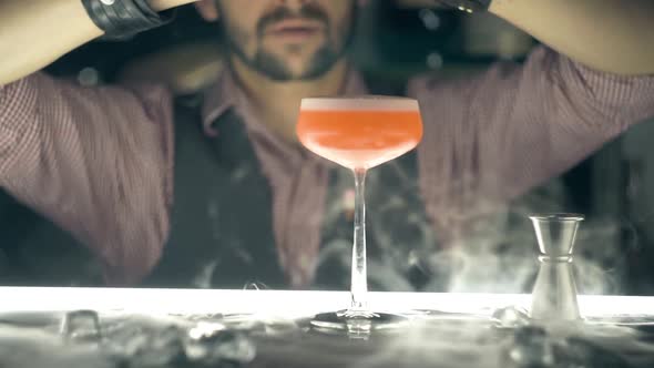 Barman Make a Cocktail on a Bar