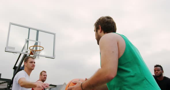 Basketball player throwing basketball in hoop 4k alt