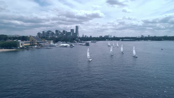 Breathtaking Bird's Eye View of Yachts Racing on the River Towards the Camera alt