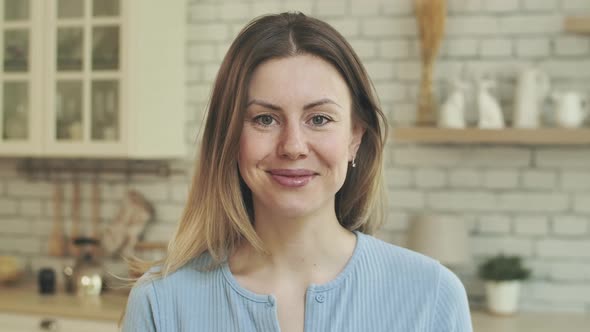 Smiling Happy Kind Blonde Girl Portrait with Mole on Face