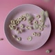Breakfast cereal rings fall into the plate - VideoHive Item for Sale