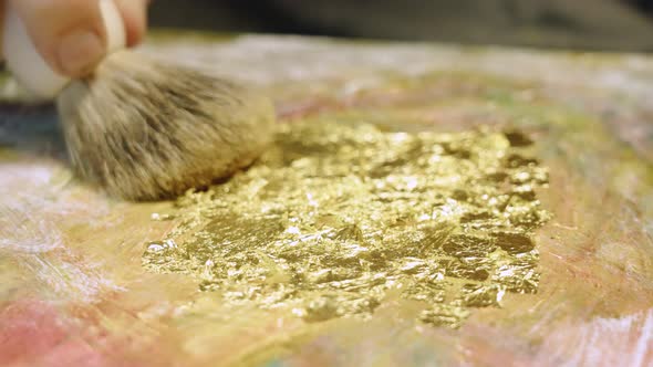 The Artist Applies Gold to the Oil Painting