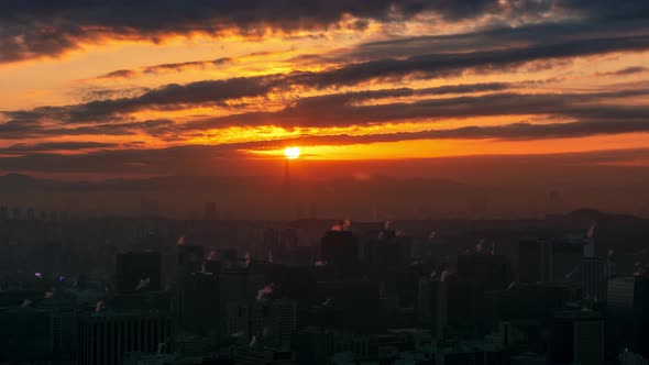 Time Lapse of Seoul City Skyline with Sunlight through clouds 