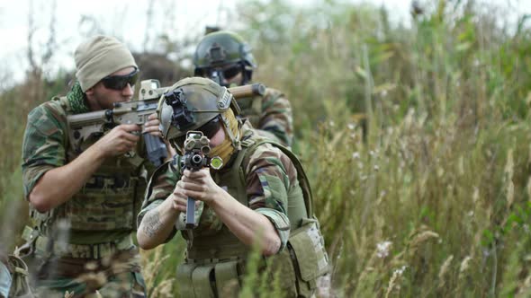 Military Group Walking through Grass, Stock Footage | VideoHive