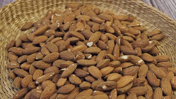 Almonds, the edible seeds of Prunus dulcis. Healthy eating and vegetarian concept.
