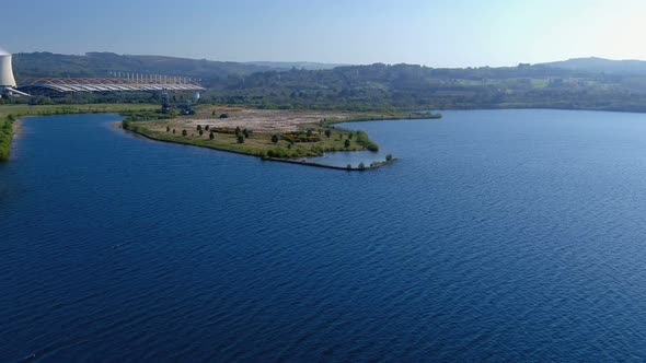 aerial view of the lake and the thermal power plant for the production of electricity with the old f alt