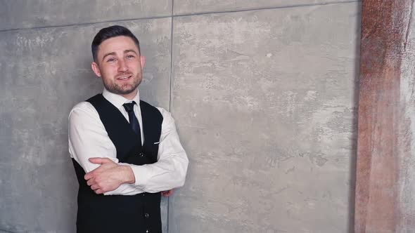 Smiling Young Business Man Caucasian Ethnicity with a Beard Middle Aged in Classic Black Suit Shirt alt