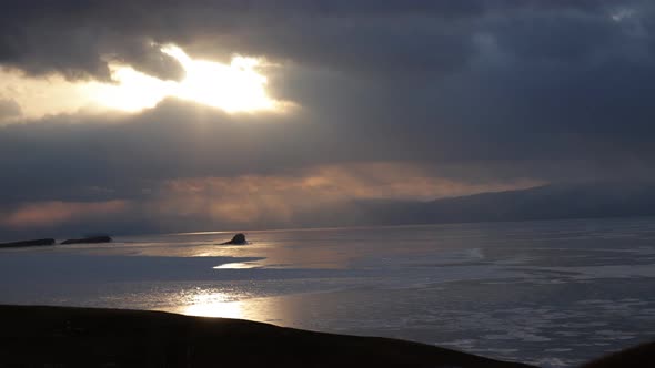 Time Lapse of Sunset on Baikal Lake in Winter alt
