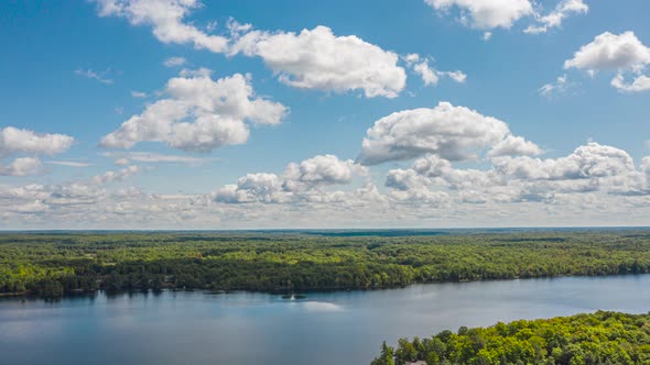 Aerial Time Lapse Of Beautiful Summer Lake And Islands With Clouds Moving Fast 02